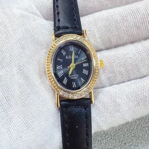 Kloris women's quartz watch with black leather strap oval rhinestone gold bezel
