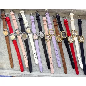 Women quartz watch with oval rhinestone dial and slim leather strap, colorful watch set.