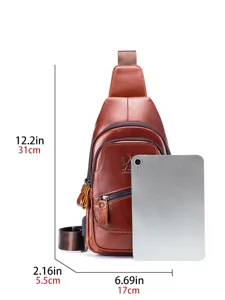 Genuine leather men sling chest bag casual vintage USB crossbody bag for tablet daily use.