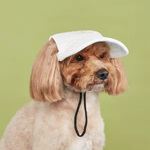 Cute pet sun hat for dogs, white adjustable baseball cap with visor, summer outdoor pet fashion.