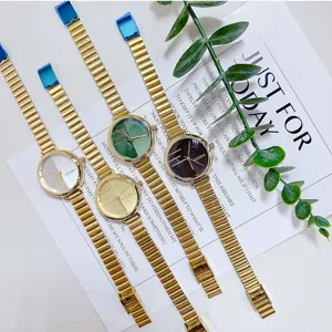 Reloj de mujer vintage en oro con correa de metal bambu unica, elegante reloj de cuarzo.