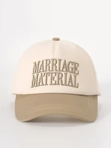 Detailed close-up of the stylish two-tone embroidered baseball cap highlighting front lettering.