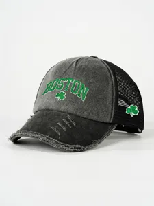 Distressed grey mesh trucker hat with green Boston clover embroidery and curved brim.