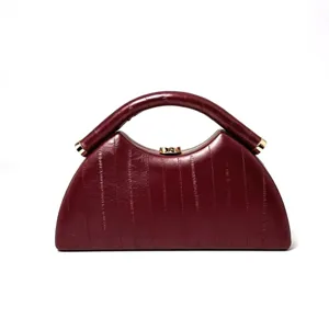 Retro eel pattern semi-circular structured handbag, elegant burgundy evening bag for women.