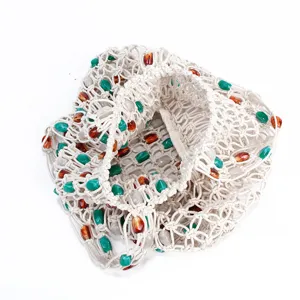 Handmade woven mesh shoulder bag with colorful beads, stylish hollow beach tote for women.