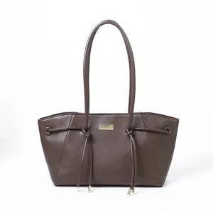 Vintage dark brown leather tote bag for women, large capacity shoulder handbag with stylish strap.
