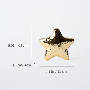 Gold metallic star evening clutch bag with glossy hammered finish, compact size 15x15x4cm.