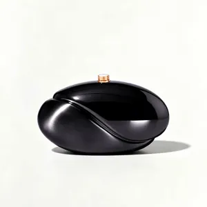 Detailed view of black wave acrylic clutch bag, sleek glossy finish with metal clasp.