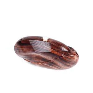 Brown tortoiseshell acrylic clutch bag with wave design and metal clasp for women party