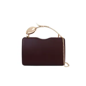 Elegant dark brown evening clutch bag with gold metallic tulip handle and chain strap for women.