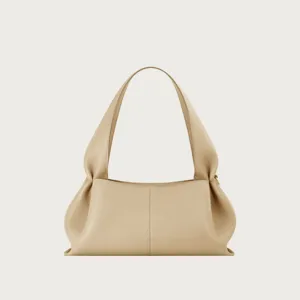 French minimalist leather underarm bag, chic dumpling shoulder bag with long handle details.
