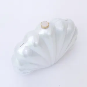 Pearlescent acrylic shell clutch bag with luxury gold tone clasp for women evening party wear