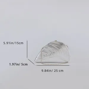 Silver acrylic shell clutch bag detail showing size dimensions and metallic ribbed texture.