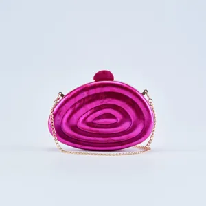 Acrylic box clutch bag with gold chain strap, stylish marbled pink shoulder bag for women.