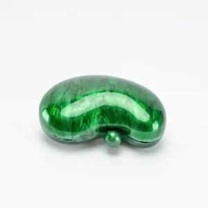 Green resin bean shaped evening clutch bag detail, marble pattern hard case handbag design.