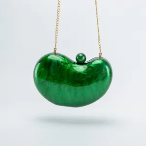 Green acrylic bean shape evening clutch bag with gold chain shoulder strap for women.