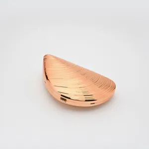 Elegant rose gold shell evening clutch bag, perfect for parties, weddings and luxury style events.