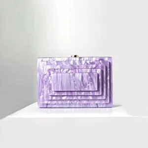 Purple marbled acrylic clutch bag, elegant hard case design with metal clasp for women.
