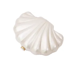Stylish acrylic shell clutch bag for women, elegant pearl white evening shoulder bag.
