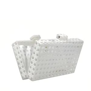 White acrylic woven texture clutch bag detail, stylish accessory for evening parties and weddings.