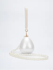 Sac pochette en acrylique en forme d'œuf de perle avec chaîne d'épaule chic pour femme.