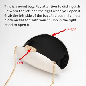 Detailed view of the white marble acrylic evening clutch bag with delicate metal clasp lock.