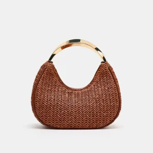 Brown woven hobo handbag for women, chic crescent shoulder bag with gold metal handle.