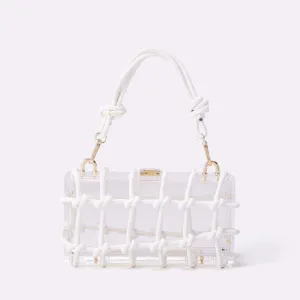 Transparent acrylic box handbag detail with white woven rope knot and gold hardware.