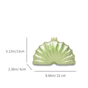 Elegant green acrylic shell clutch bag with pearl clasp for evening parties and banquets.