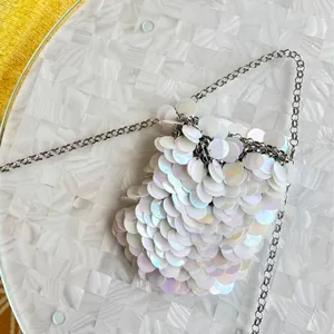 Sparkling sequin phone bag with silver chain strap stylish mini crossbody pouch for women.