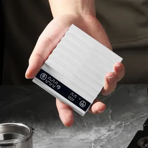 Mini bilancia da caffè elettronica con timer, strumento di cucina digitale per caffè espresso.