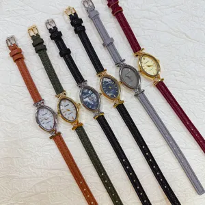Elegant slim leather strap quartz watch featuring an exquisite oval dial for women daily.