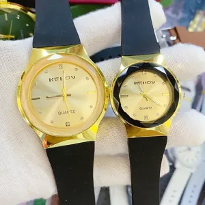 Vintage couple quartz watch with silicone strap, stylish gold case and diamond markers for daily wear.