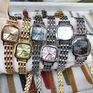 Detailed view of square women's quartz watch with metal chain strap and multiple colors.