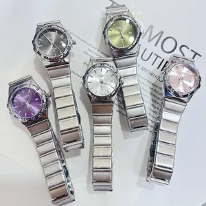 Detail view of BAITINGE fashion quartz watches with colorful dials and metal strap.
