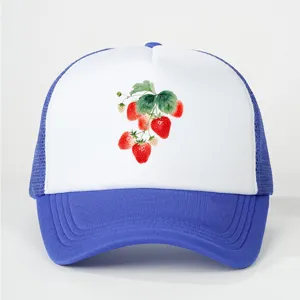 Detailed view of a stylish blue white trucker hat with watercolor strawberry print.