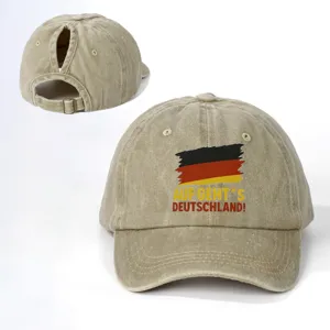 Verworfene Baumwoll-Baseballcap mit Pferdeschwanzloch und deutschem Fan-Slogan-Druck.
