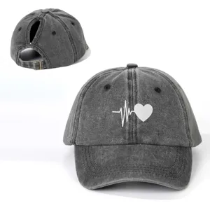 Washed grey ponytail baseball cap with heartbeat heart print, adjustable outdoor hat.