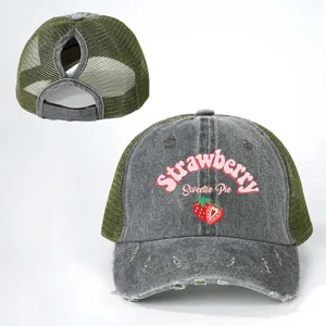 Distressed washed mesh baseball cap with ponytail hole and cute strawberry front print.