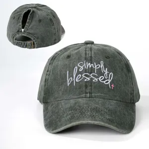 Distressed ponytail baseball cap with embroidered simply blessed text and adjustable metal buckle