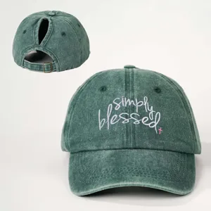 Distressed green ponytail baseball cap with simply blessed embroidery and adjustable back strap detail.