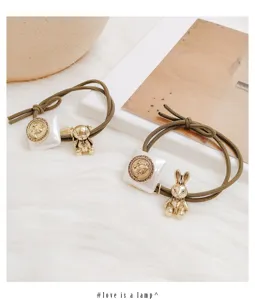 Cute bear and rabbit hair ties with vintage coin pendants, forest style elastic headbands for women.