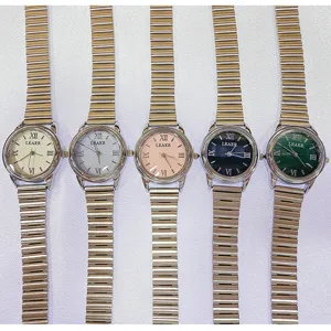 Modische Damen Quarzuhr mit elastischem Metallarmband und klassischen Römischen Ziffern.