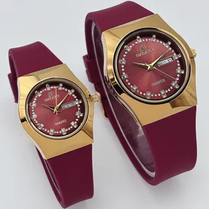 Reloj de cuarzo pareja GALAXY silicona pedreria doble calendario caja dorada burdeos