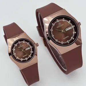 Juego de relojes de cuarzo para pareja correa silicona marrón caja oro rosa esfera de estrás.