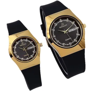 Reloj de cuarzo para parejas GALAXY con correa de silicona negra y esfera dorada.
