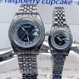 Stainless steel quartz couple watch set with crystal roman numerals and calendar date window.