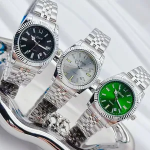 Damen Quarzarmbanduhr mit Edelstahlarmband und geriffelter Lünette, elegante Damenuhr.