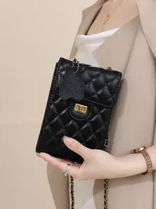 Black quilted leather phone bag with chain strap and gold turn-lock closure detail.