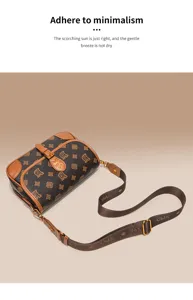Detailed view of the stylish brown monogram shoulder bag showcasing exquisite leather trim.